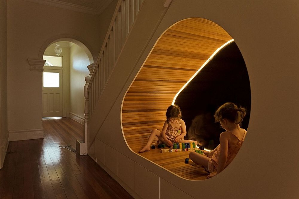 Innovative pod under the staircase acts as a lovely kids' play area