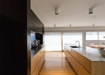 Kitchen-and-dining-area-along-with-the-living-space-in-wood-with-unabated-views-217x155