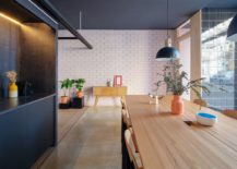 Large-gray-pendant-subway-tiles-and-wooden-surfaces-inside-the-office-217x155