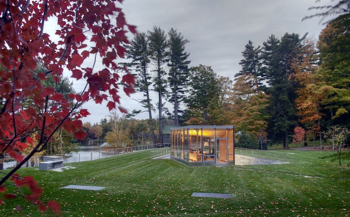 Lovely lake and natural greenery provide a stunning setting for the pool pavilion