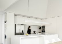 Minimal-all-white-kitchen-with-space-savvy-shelving-217x155