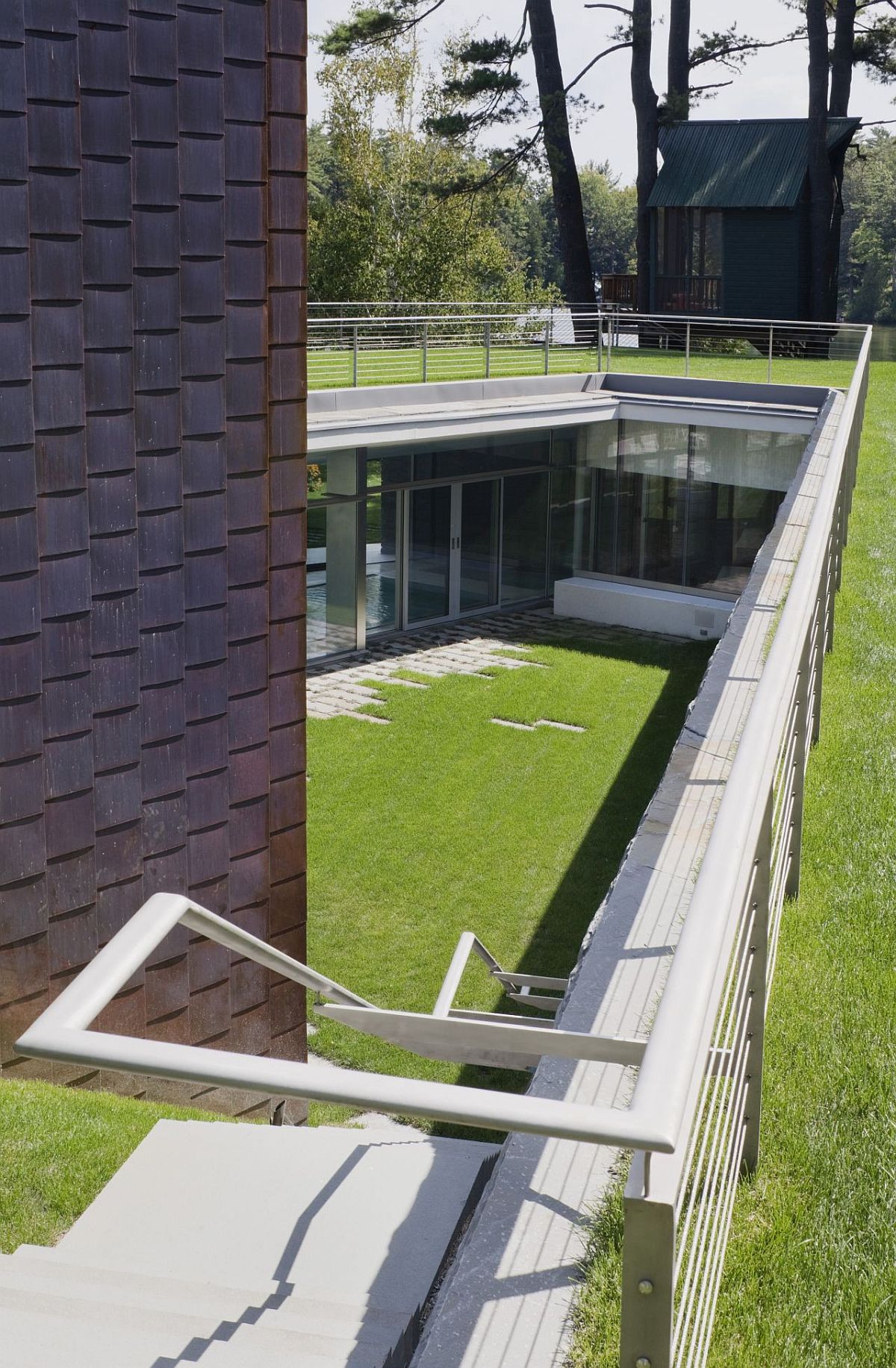 Natural rift in the land has been turned into a wonderful pool pavilion