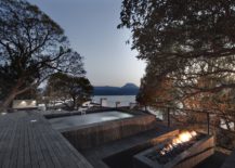 Outdoor-sitting-area-and-fireplace-along-with-Jacuzzi-that-offers-Lake-views-217x155