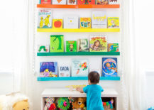 Rainbow-bookshelves-in-a-nursery-designed-by-Studio-DIY-217x155