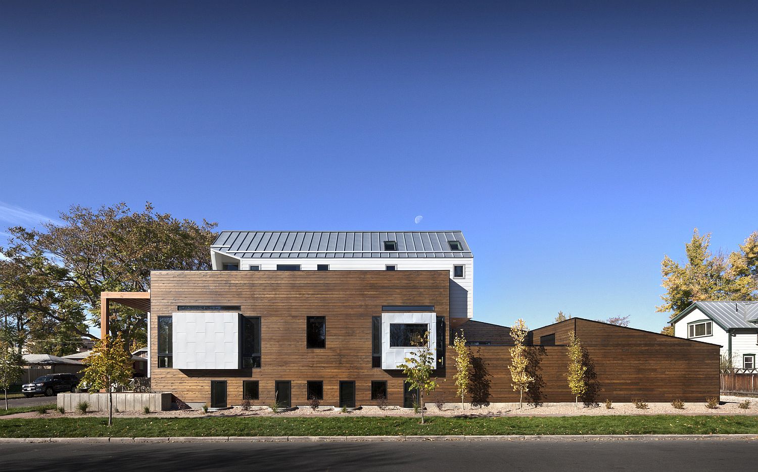 Revamped contemporary home in denver lifted above the street level