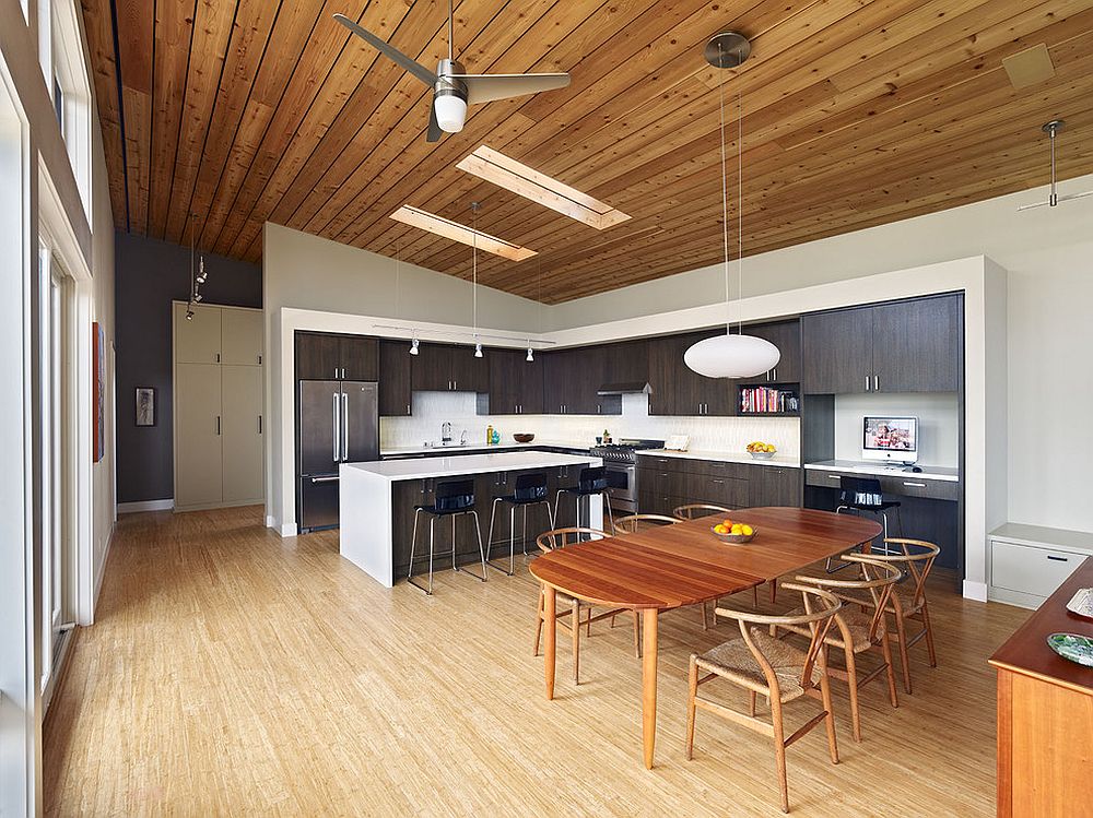 Simple and minimal wooden ceiling complements the modern style of the kitchen perfectly
