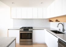 Small-white-kitchen-with-open-box-style-wooden-cabinet-and-lovely-lighting-217x155