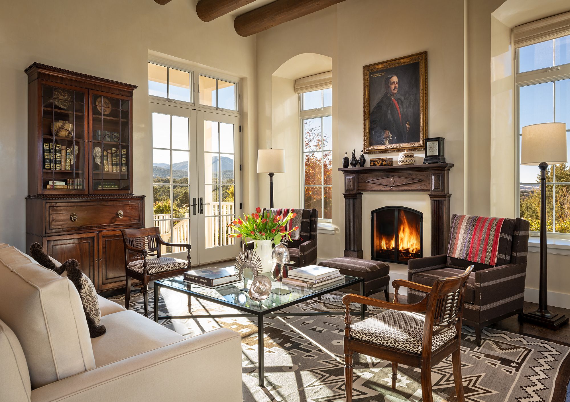 Spacious living room with a cozy fireplace at its heart