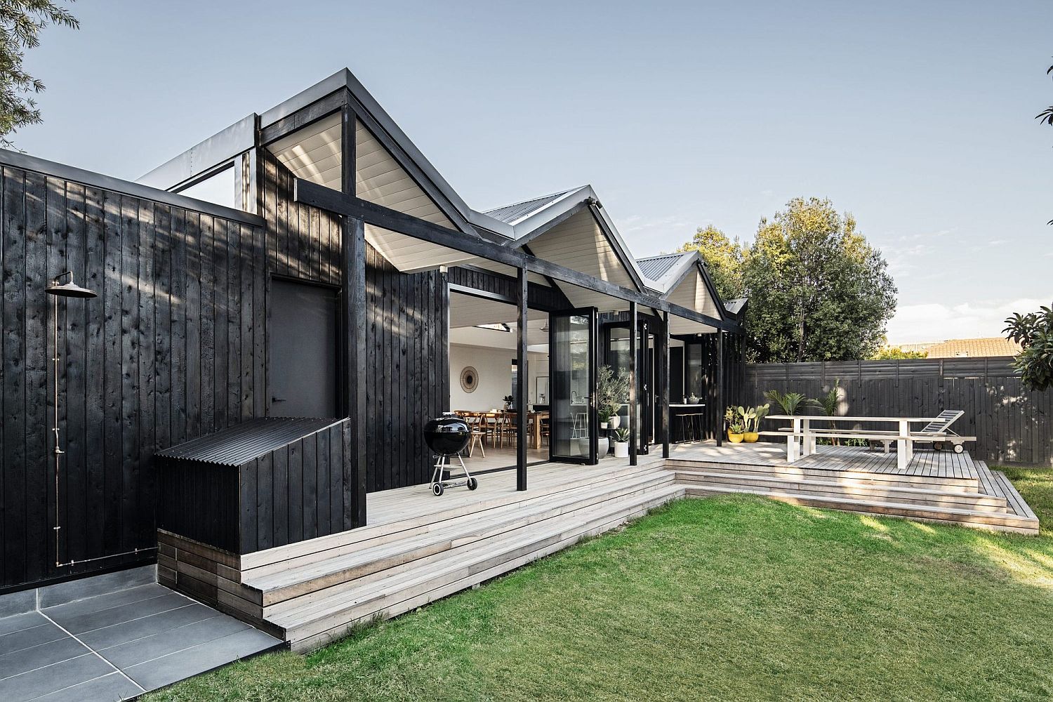 Folded Roof in Charred Cypress Creates a Stunning Modern Extension Down Under!