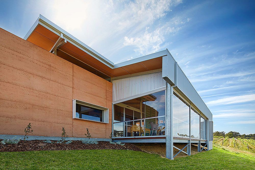 Tasting gallery with glass walls overlooking the hills outside