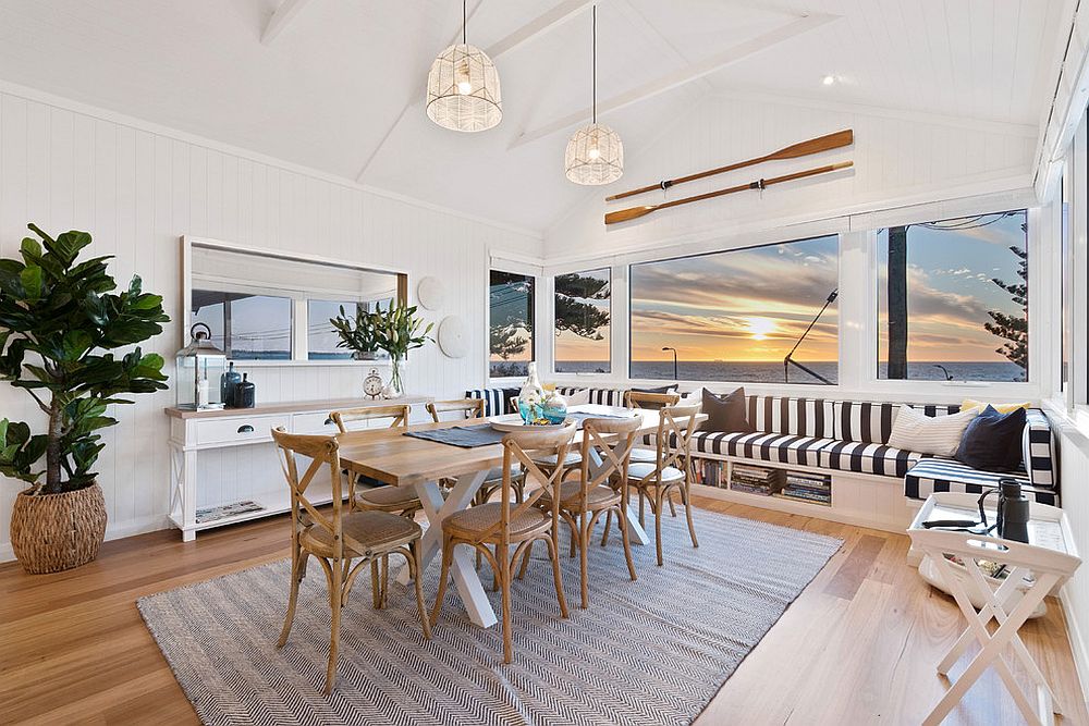 View-of-the-the-ocean-and-the-sunset-makes-this-beach-style-dining-room-even-more-special