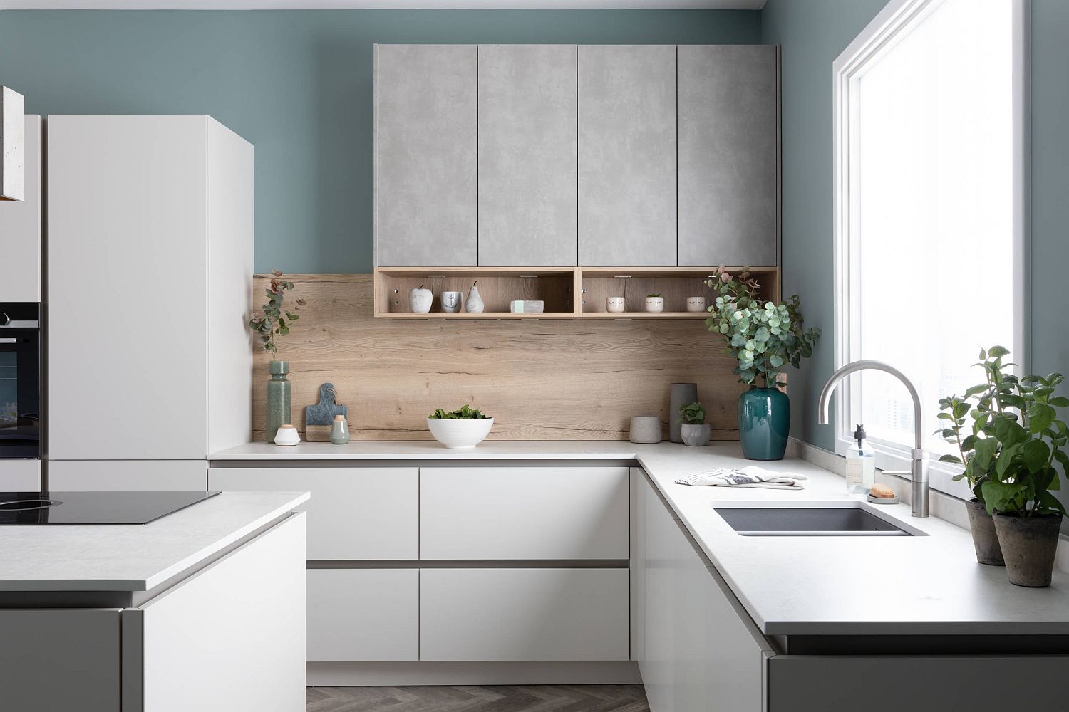 White-kitchen-with-a-touch-of-blue-and-gray-usher-in-Scandinavian-minimalism