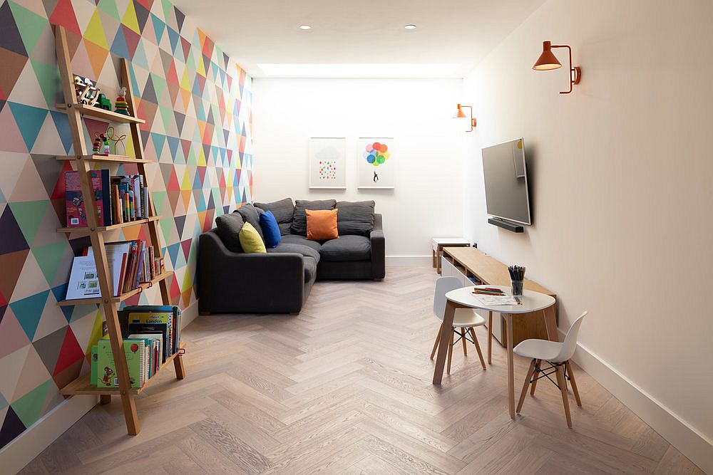 Basement family room with multi-colored accent wall