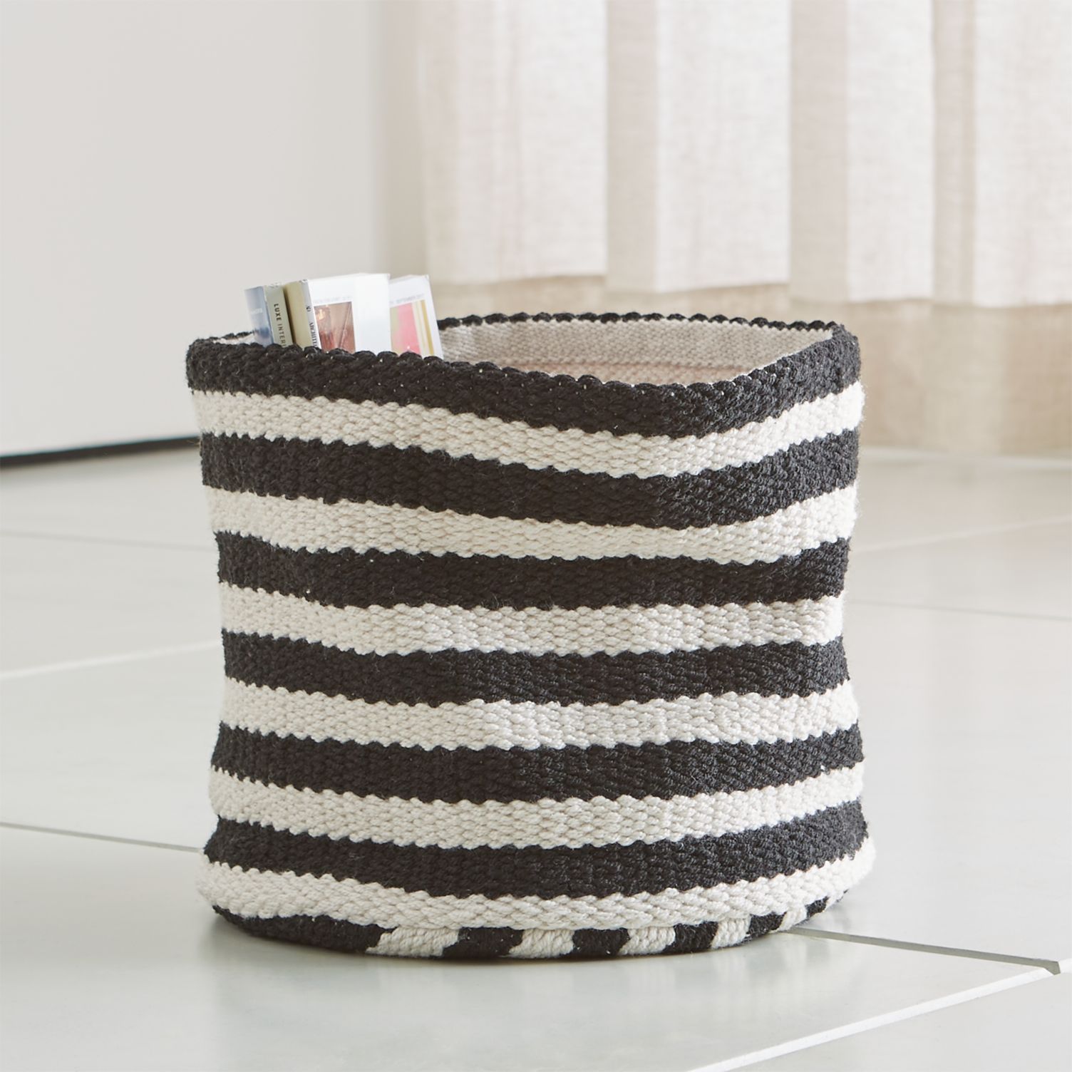 Black and white striped woven basket