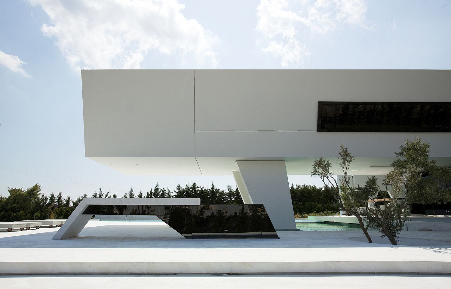 Cantilevered structure of the house offers natural shade