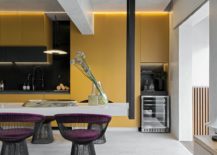 Colorful-bar-stools-in-purple-along-with-mustard-yellow-backdrop-and-black-accents-in-the-kitchen-217x155