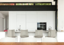 Contemporary-kitchen-with-minimal-cabinets-in-white-that-create-a-lovely-backdrop-217x155