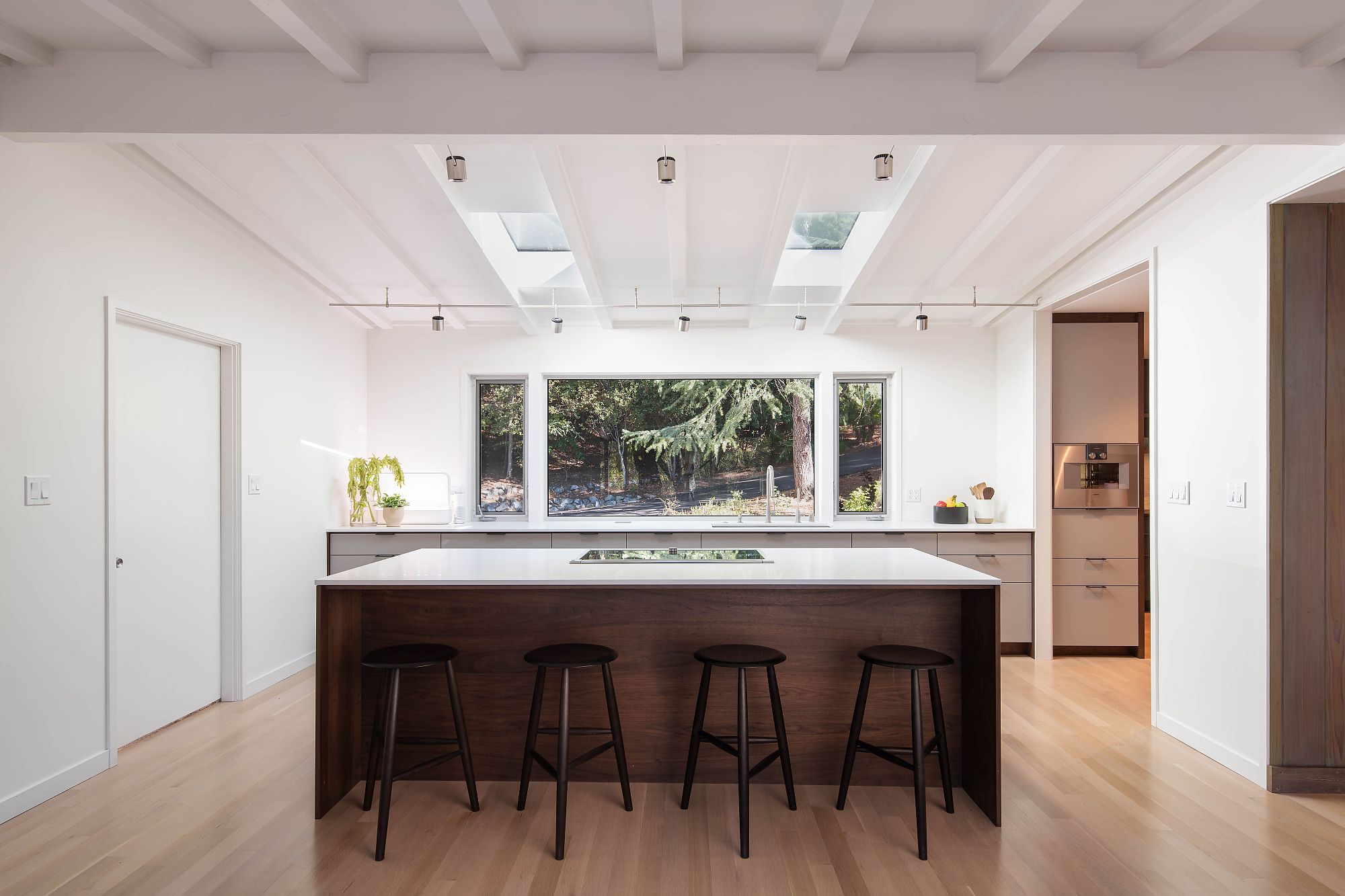 Custom cabinetry from Henrybuilt used to revamp the kitchen delightfully