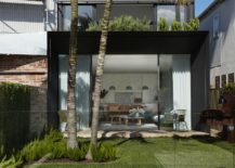 Dark-steel-canopy-with-planted-roof-in-the-rear-makes-a-visual-impact-217x155