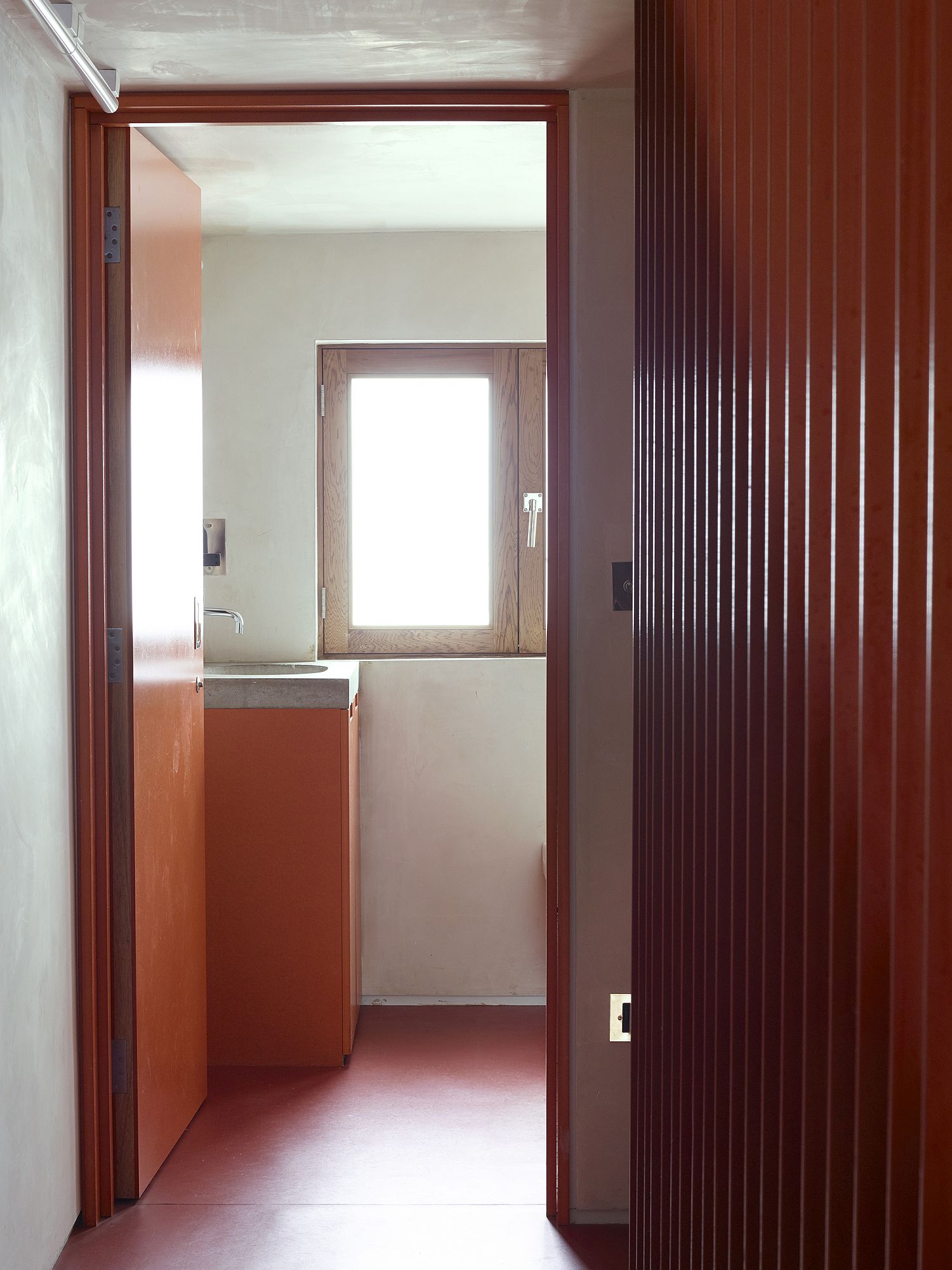 Exquisite use of orange throughout the revamped Gate House