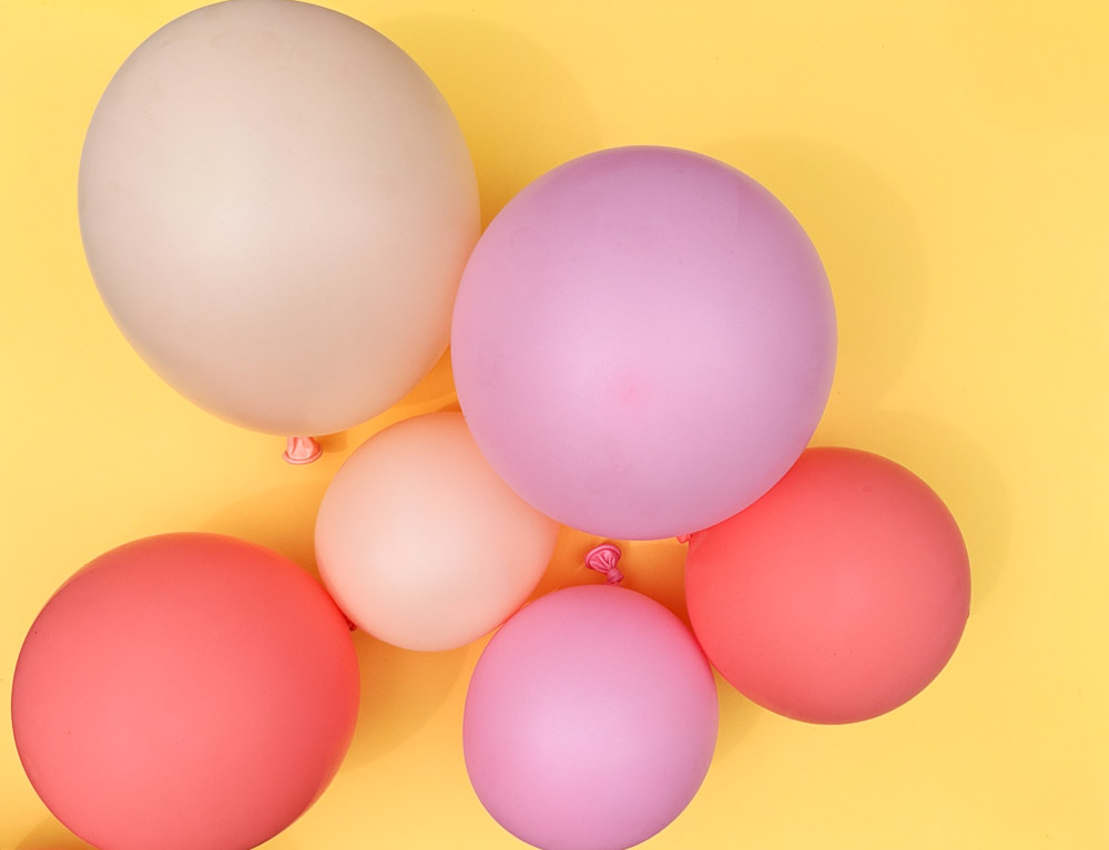Gather rosy balloons of different sizes