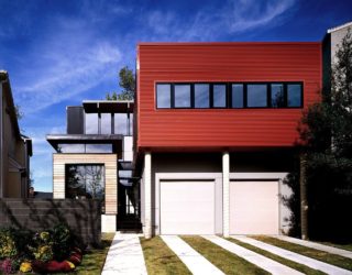 Bright Orange Corrugated Exterior Redefines Eclectic Modern Memphis Home