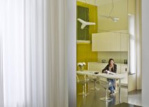 It-is-the-yellow-glass-walls-that-bring-the-colorful-glint-to-this-unique-loft-217x155