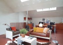 Light-filled-living-area-in-bright-orange-and-white-217x155
