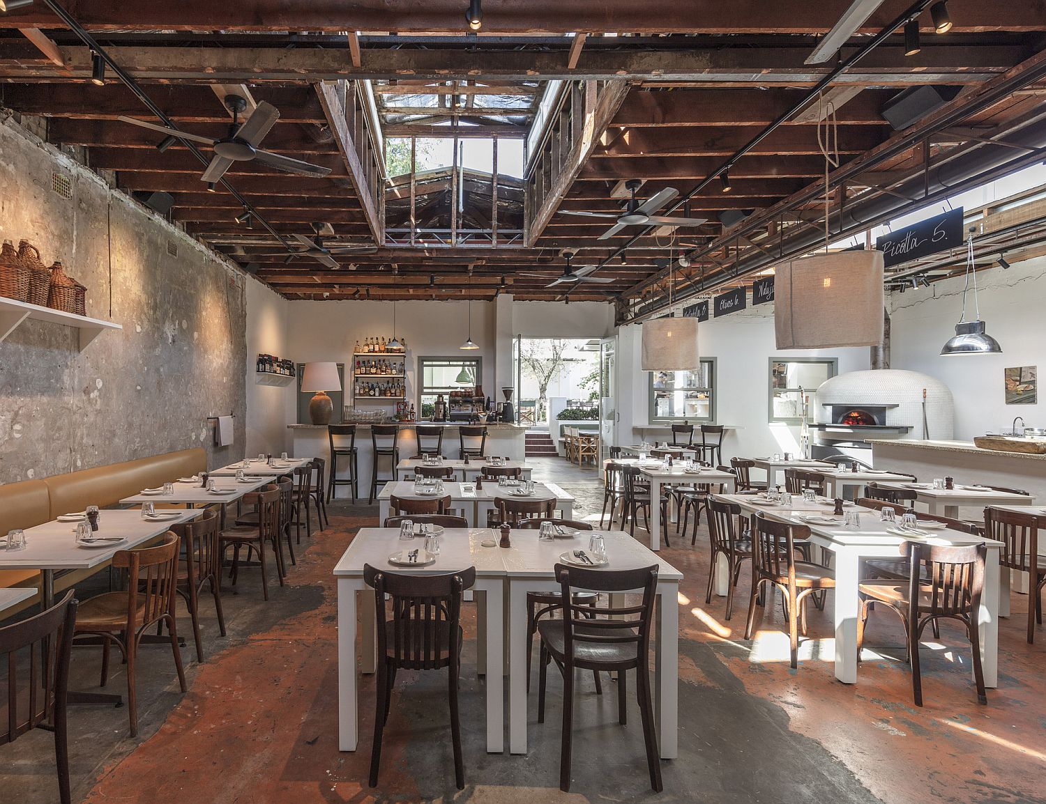 Wood, White and Green Coupled with Textural Beauty Inside Totti?s Restaurant