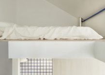 Loft-level-bed-area-inside-the-apartment-saves-ample-space-217x155