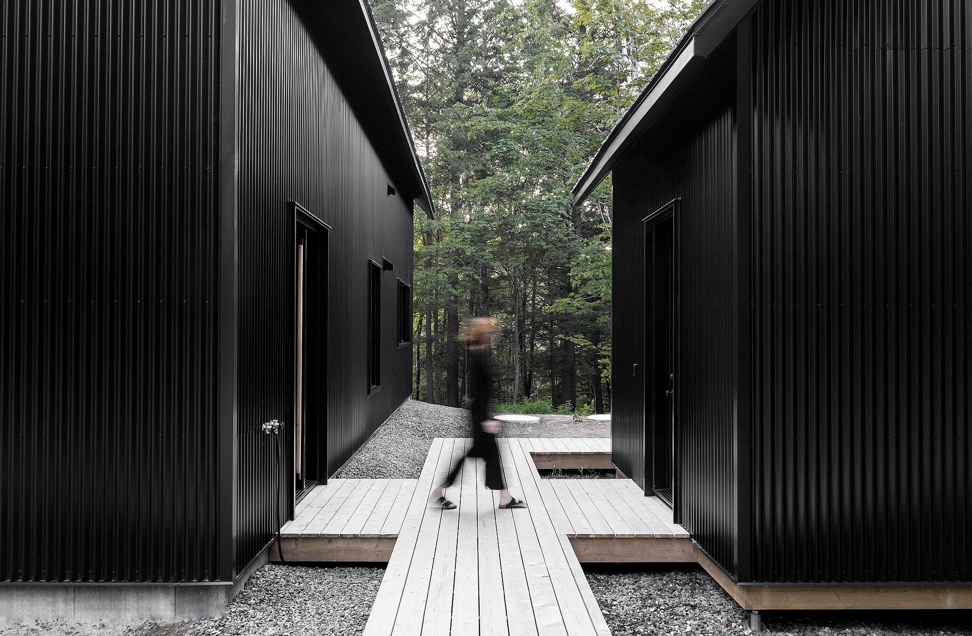 Wooden-deck-and-wlakway-connect-the-different-units-of-of-the-cabin