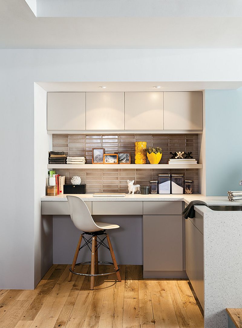 Yellow accents add color to the home office in the kitchen that is efficient and organized