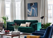 Bright-emerald-green-sofa-for-the-living-room-in-white-217x155