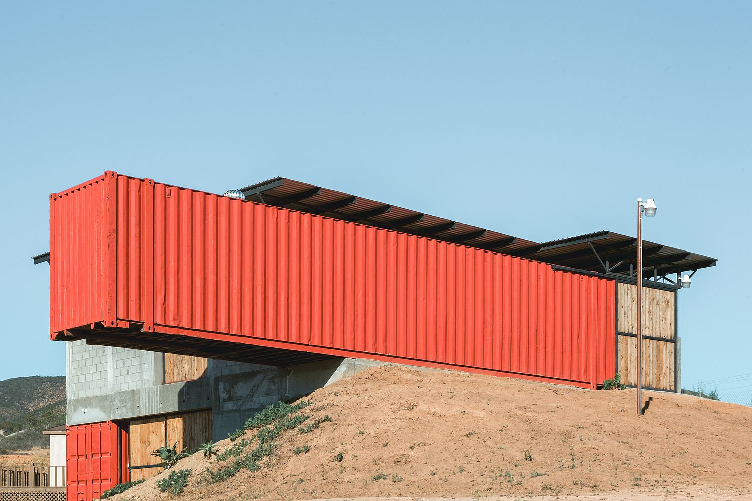 Bright orange metallic containers add charm to the wine house