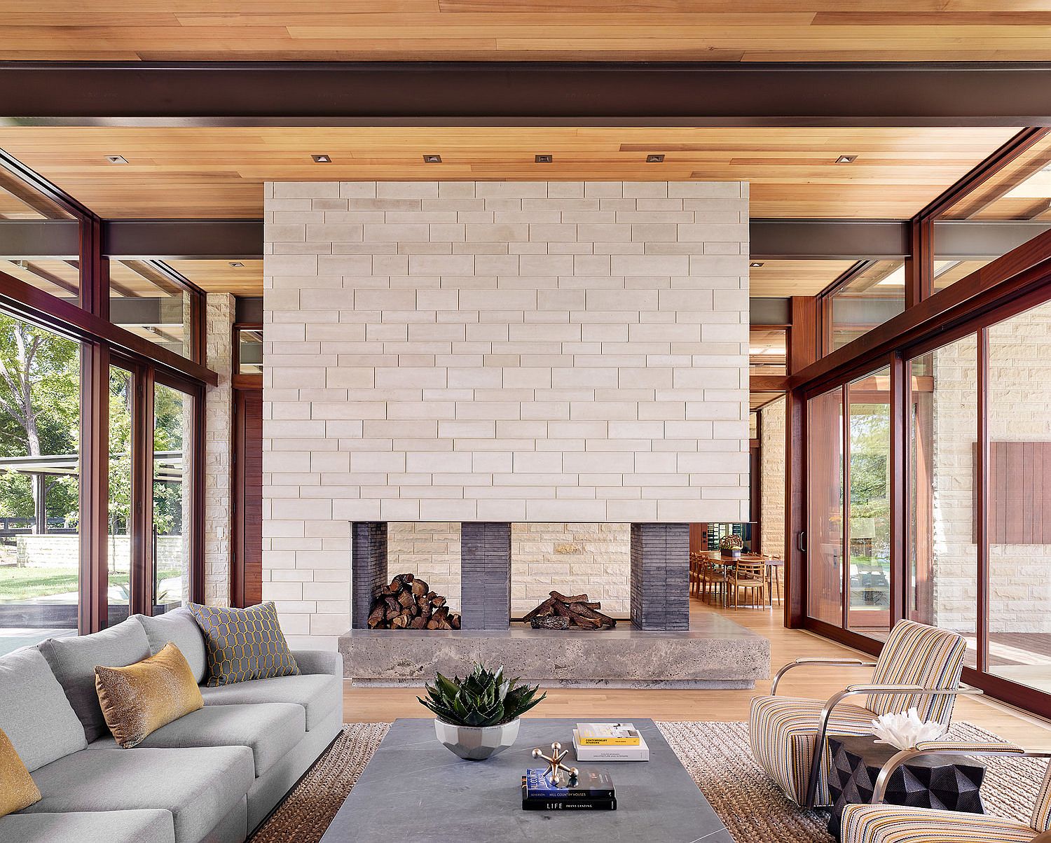 Central fireplace of the house with a wall that adds gray