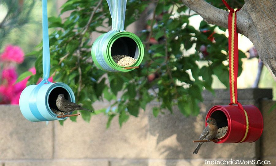 Colorful and bright paint can DIY bird feeders from Mom Endeavors