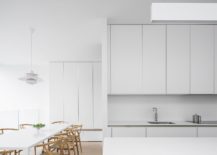 Contemporary-kitchen-and-dining-area-in-white-with-monochromatic-charm-217x155