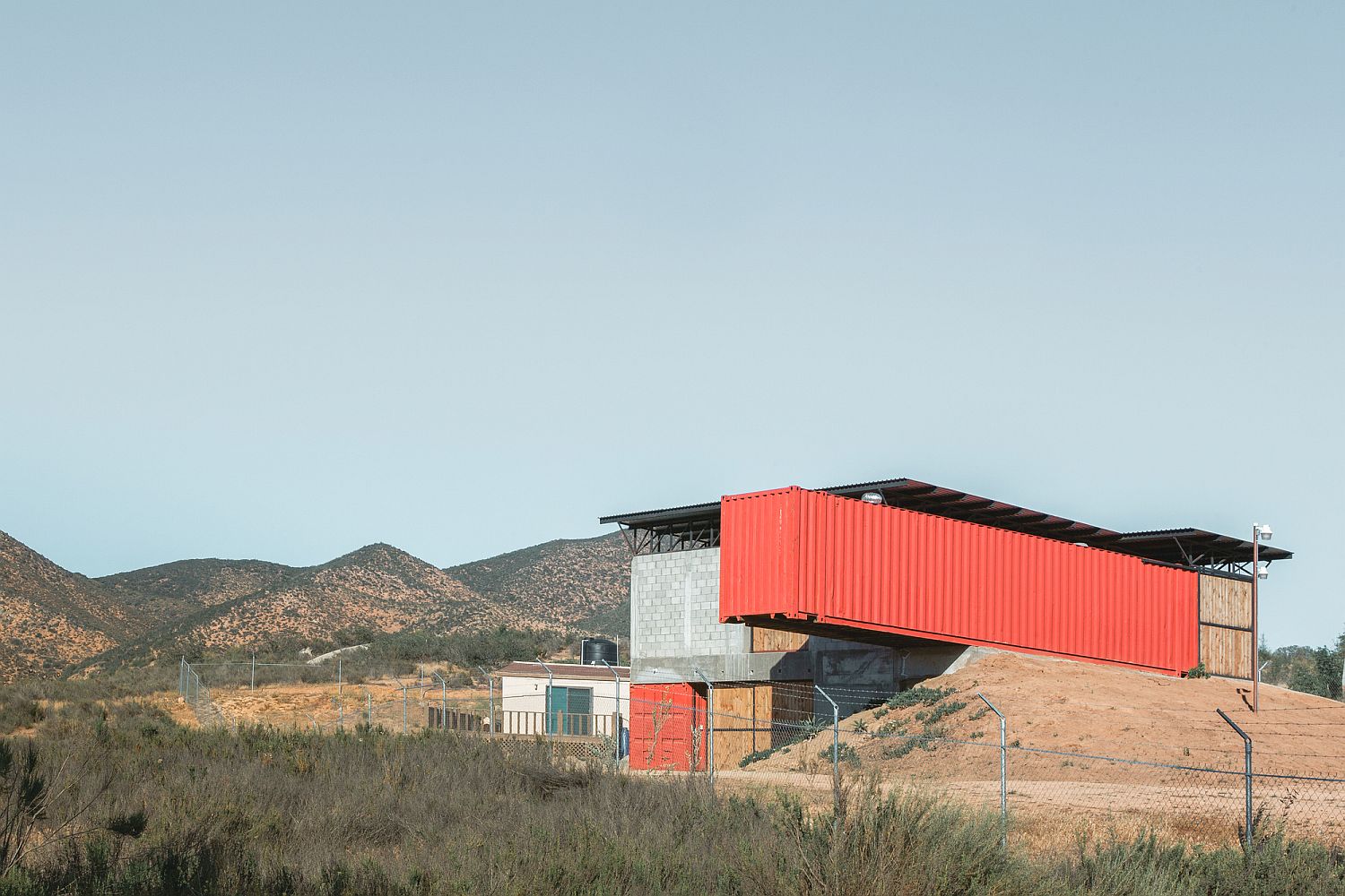 Wine House in Rugged Mexican Outback Where Metal Meets Concrete