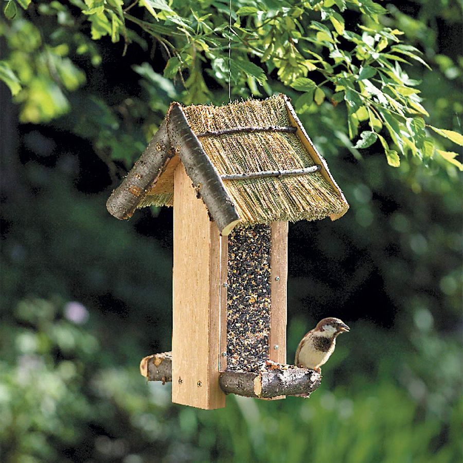 Custom-DIY-bird-feeder-full-of-rustic-charm