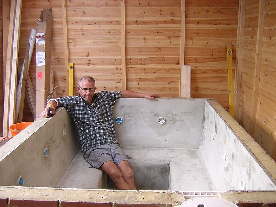 Custom relaxing concrete hot tub will last you a while!