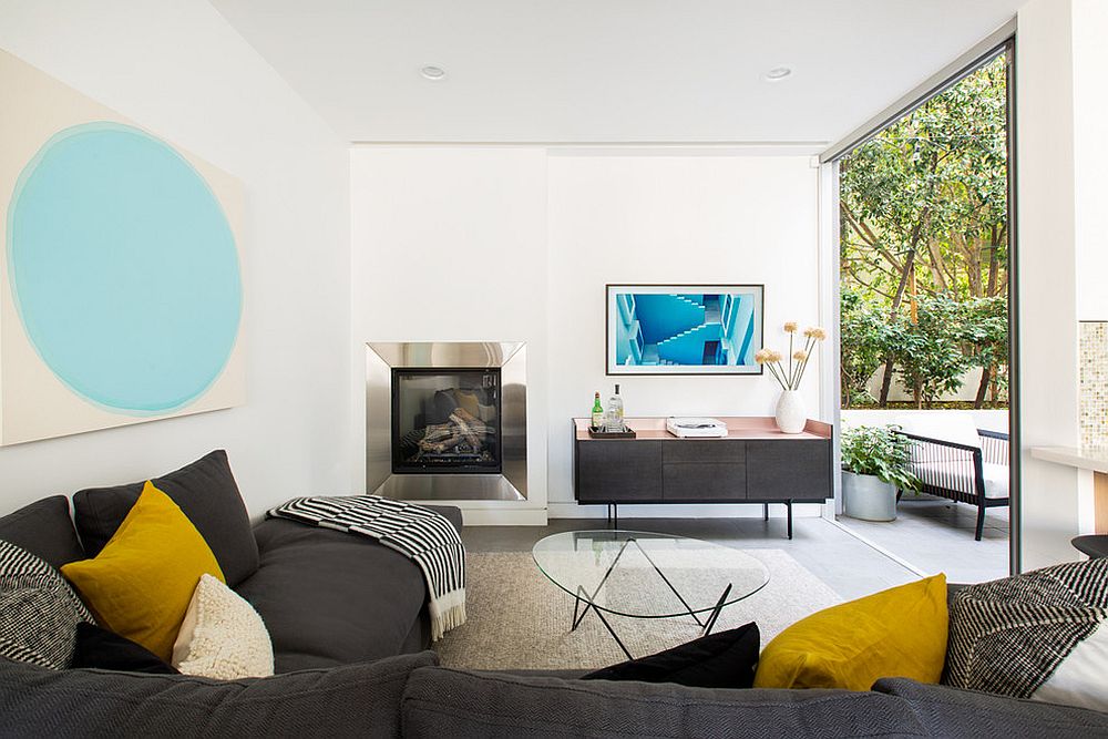 Dark gray sectional fits into the room perfectly