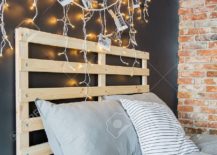 Eye-catching-bedroom-lighting-and-DIY-pallet-headboard-make-a-big-impression-217x155