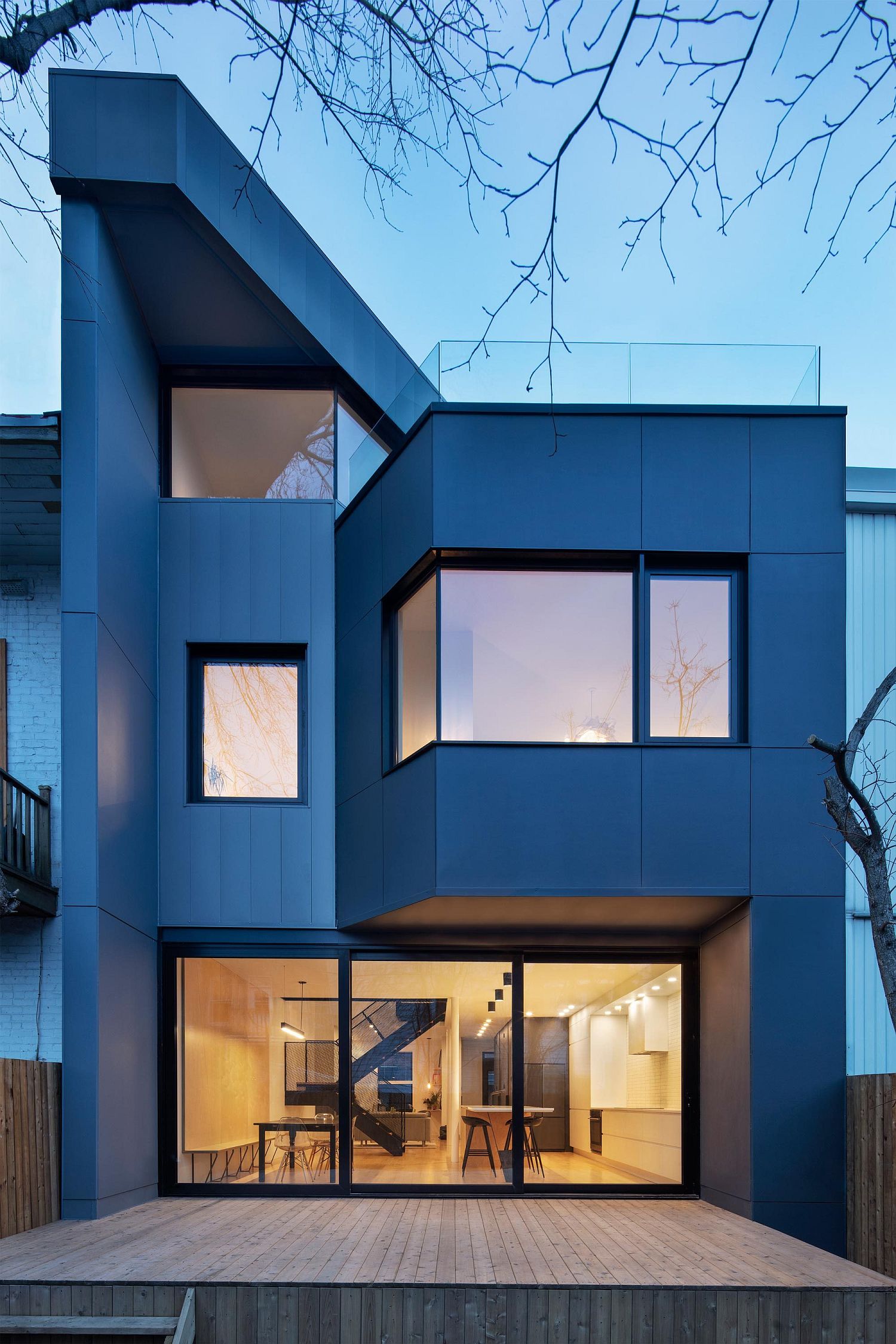 Glass and metal create a lovely contemporary extension for Montreal home