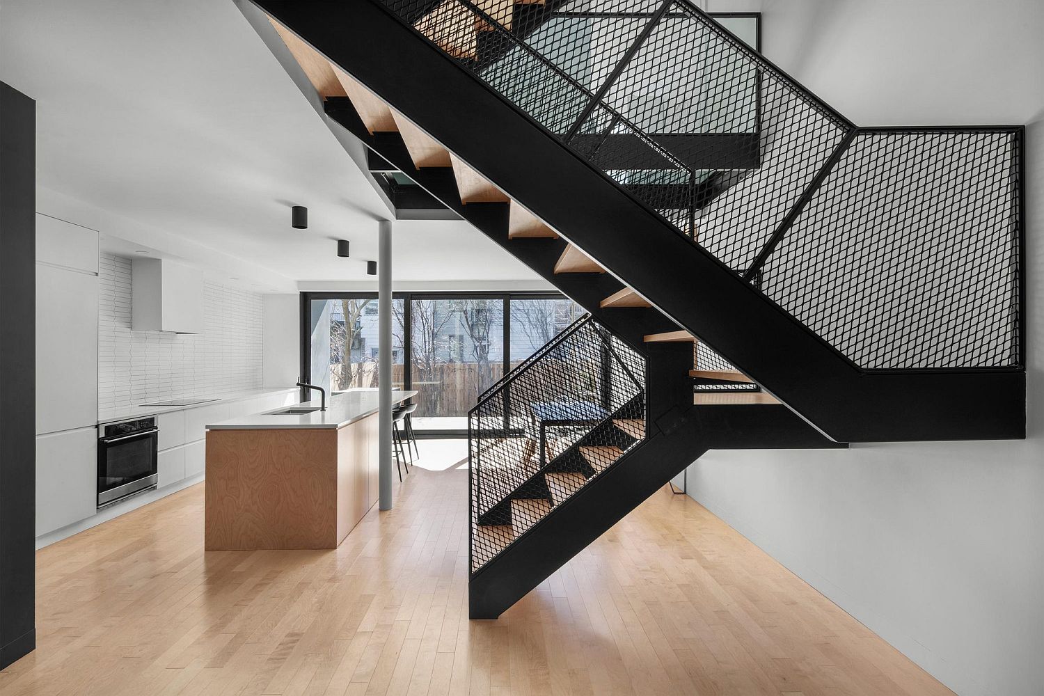 Light-filled-and-modern-interior-of-the-Dessier-Residence-in-Montreal