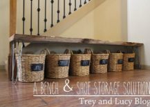 Live-edge-table-along-with-shoe-storage-baskets-for-the-modern-entryway-217x155