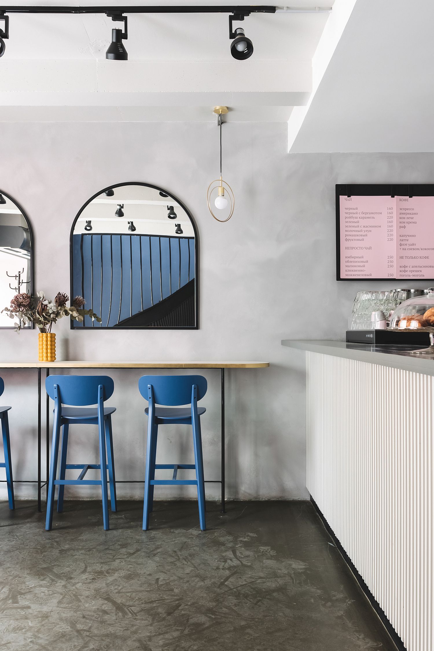 Exposed Concrete, Polished Pinks and Gentle Blues: Trendy Café in Russia