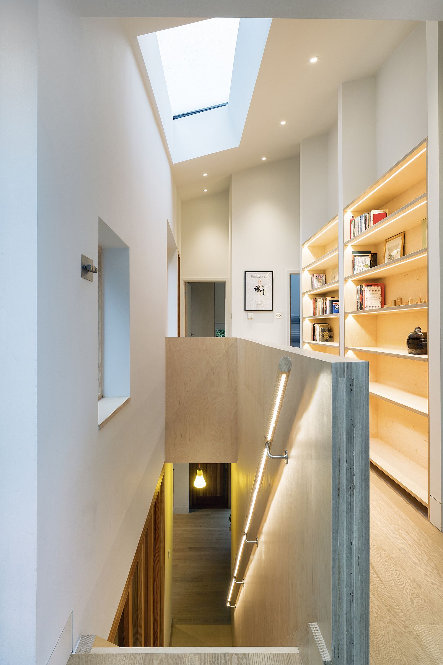 Skylight illuminates the staircase while bringing light to the lower level
