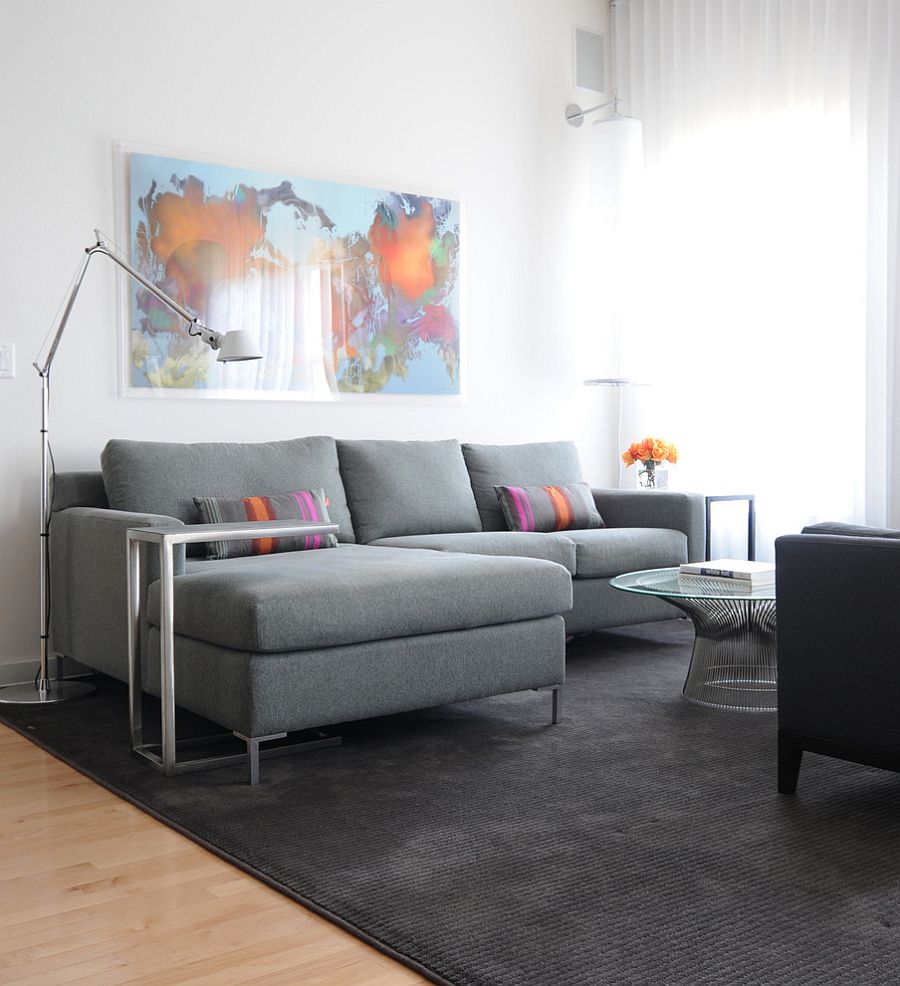 Small-gray-sectional-stands-out-thanks-to-the-white-backdrop