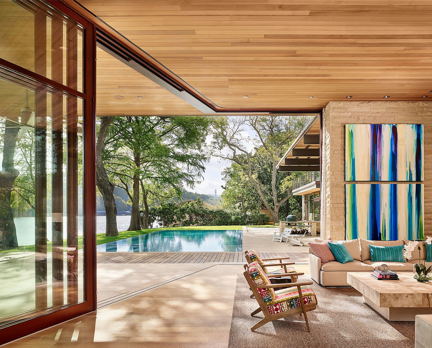 Light Floating Roofs Blend with Heavy Limestone Walls at this Vibrant  Austin Home