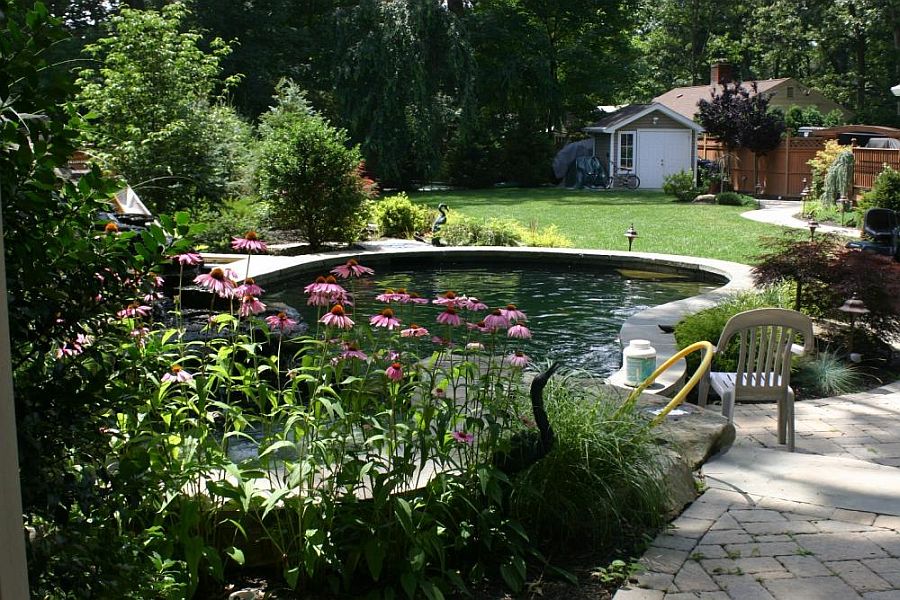 This 9-feet deep pond with concrete walls is a DIY creation that looks absolutely stunning